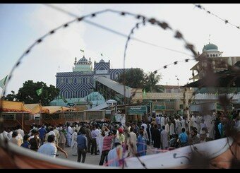 Pakistani worshippers gather at the shri